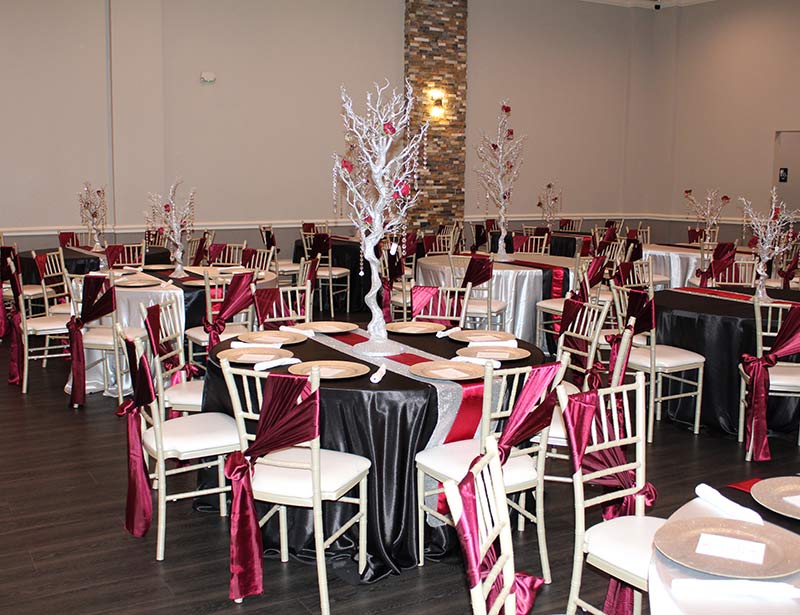 marquis ballroom event space with table decorations and catering setup