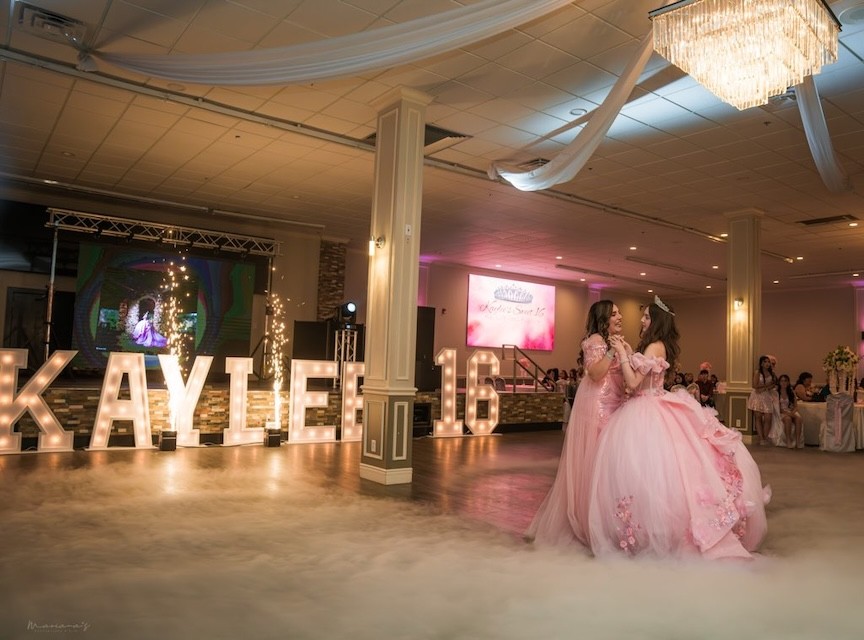 Garcia Event Centers quinceanera venue for rent in San Antonio with full decoration setup on tables and chairs