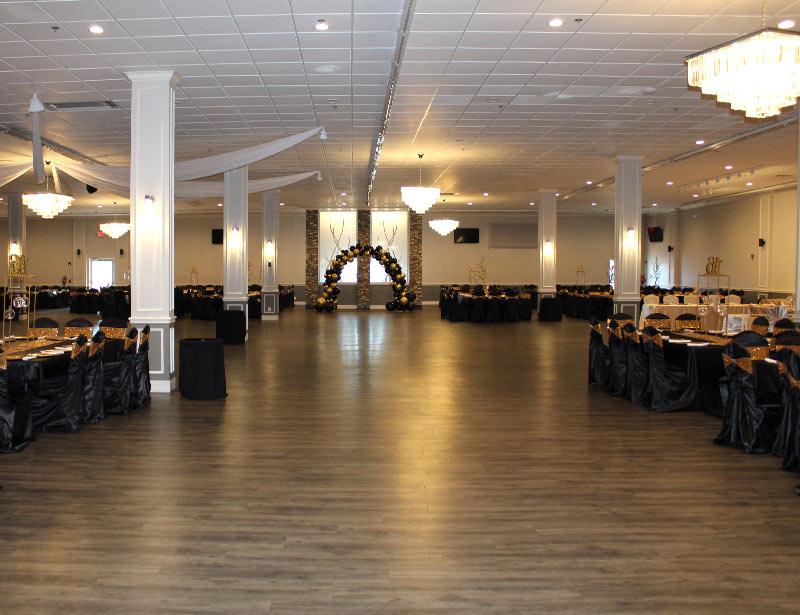 lucky ballroom event space to rent with arch decorations and empty dance floor